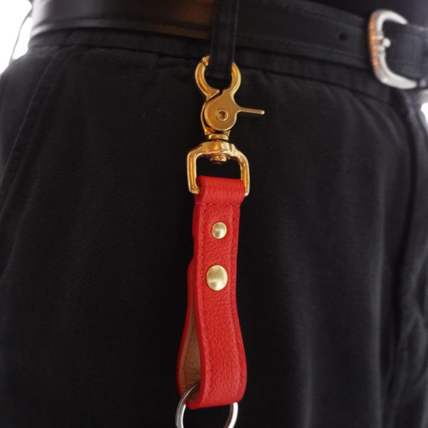 Leather key strap attached to loop closeup