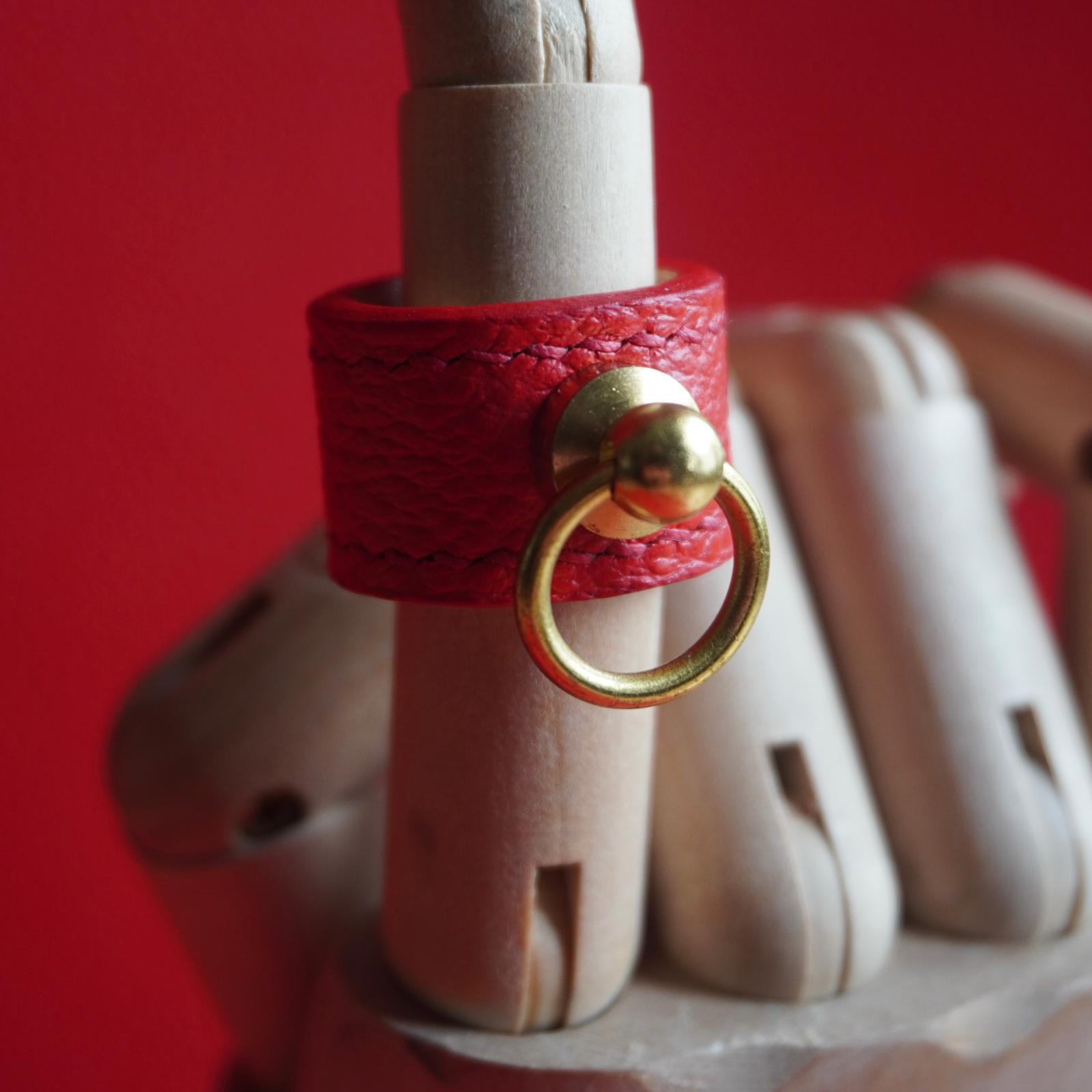 Secret Handshake Ring Red Closeup